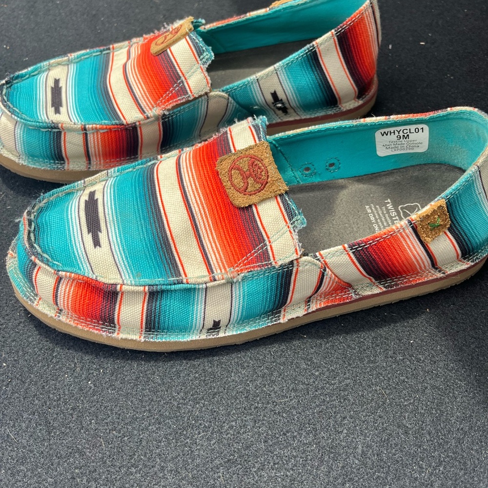 Twisted X shoes. Very comfortable, wore a few times about 1/2 too big for me.